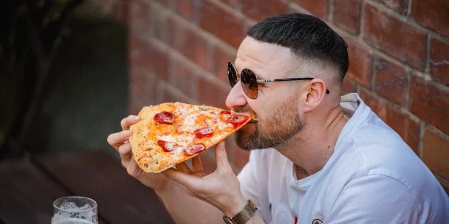 Enjoy an XL slice of pizza at Rita's