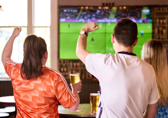 Fans cheering at Great Local Pubs