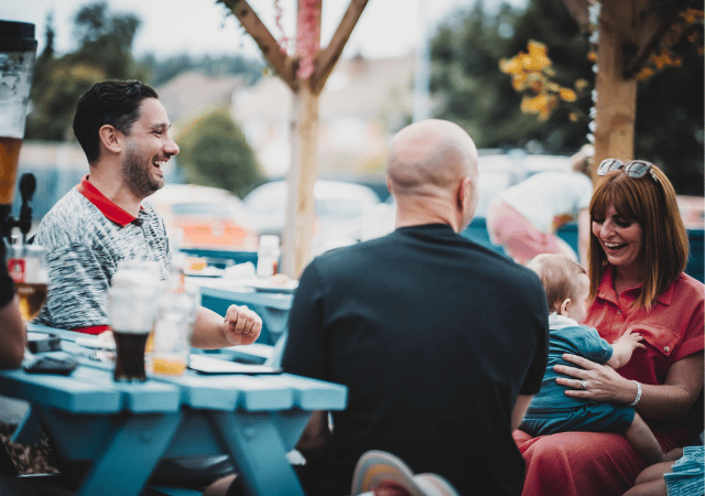 Family outside in pub beer garden