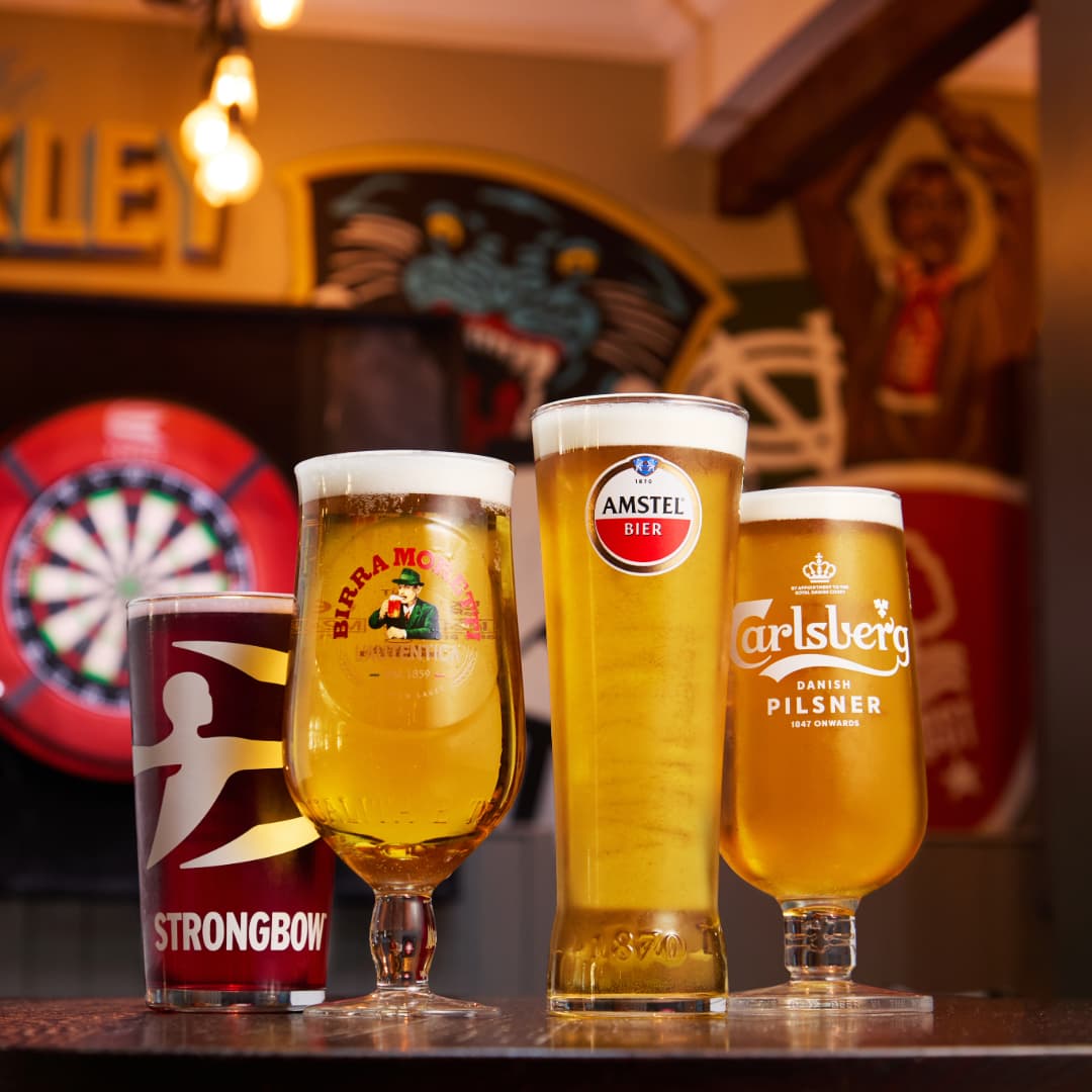 Line up of pints at Great Local Pubs