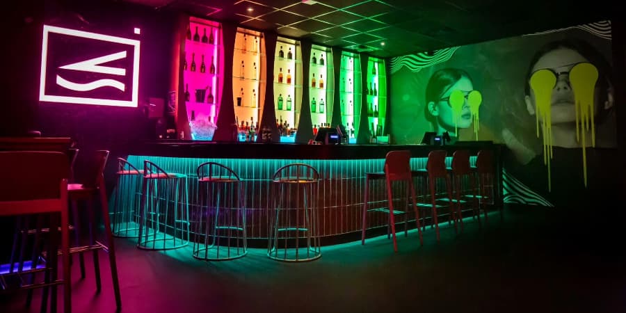 Bar in club with neon lights