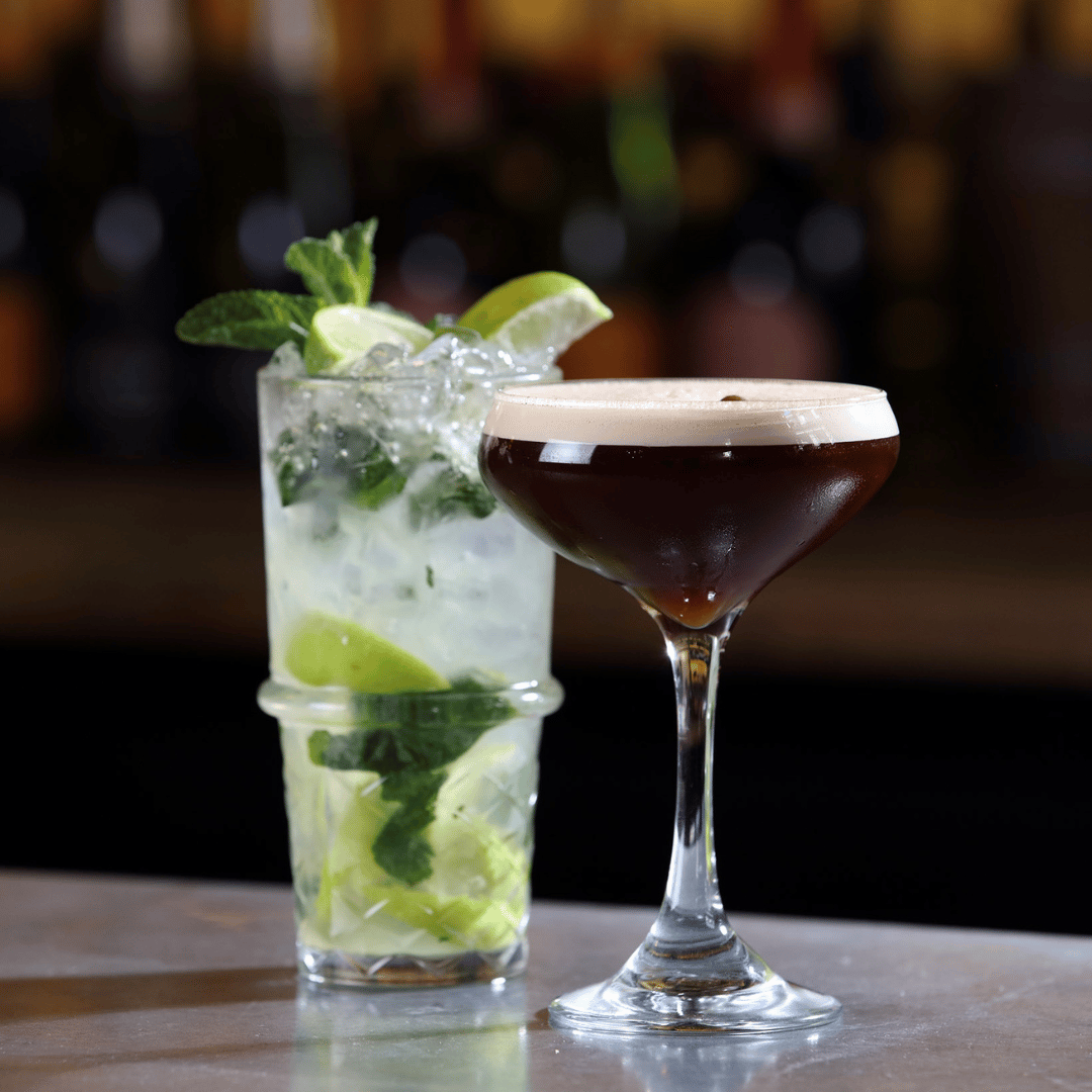 Espresso Martini and Mojito on a bar