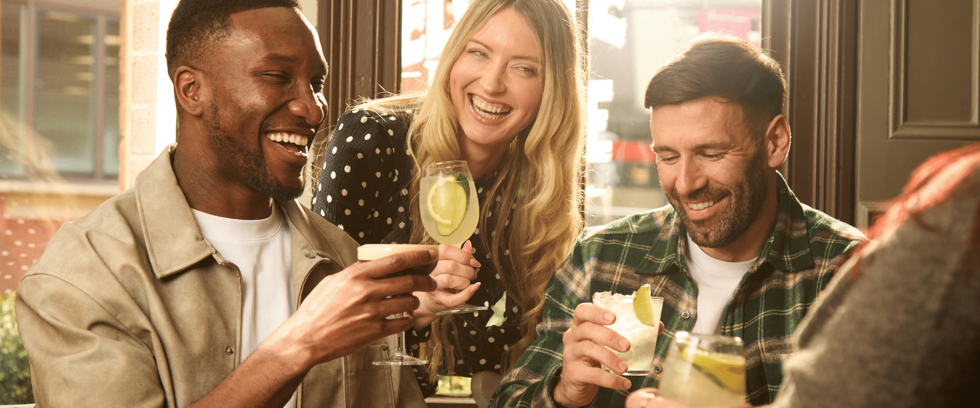 3 people enjoying drinks at The Old Brewery