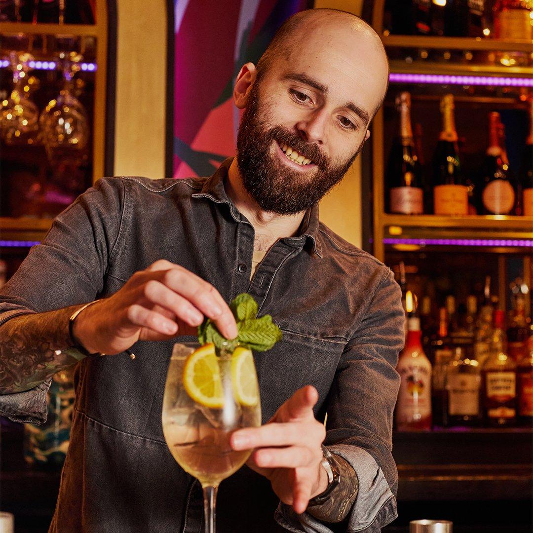 Bar team member making a cocktail