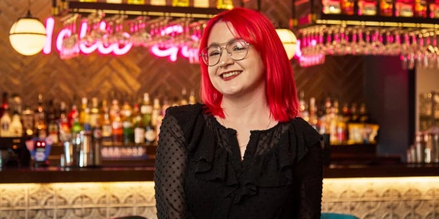 Deputy Manager at S&L smiling at camera