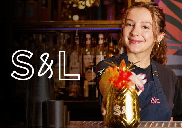 Slug & Lettuce team member behind the bar