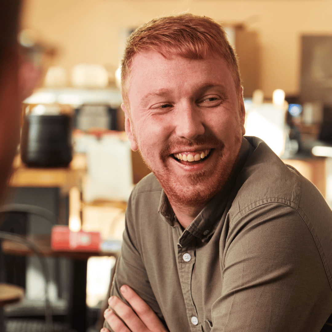 HR team member smiling towards the camera.