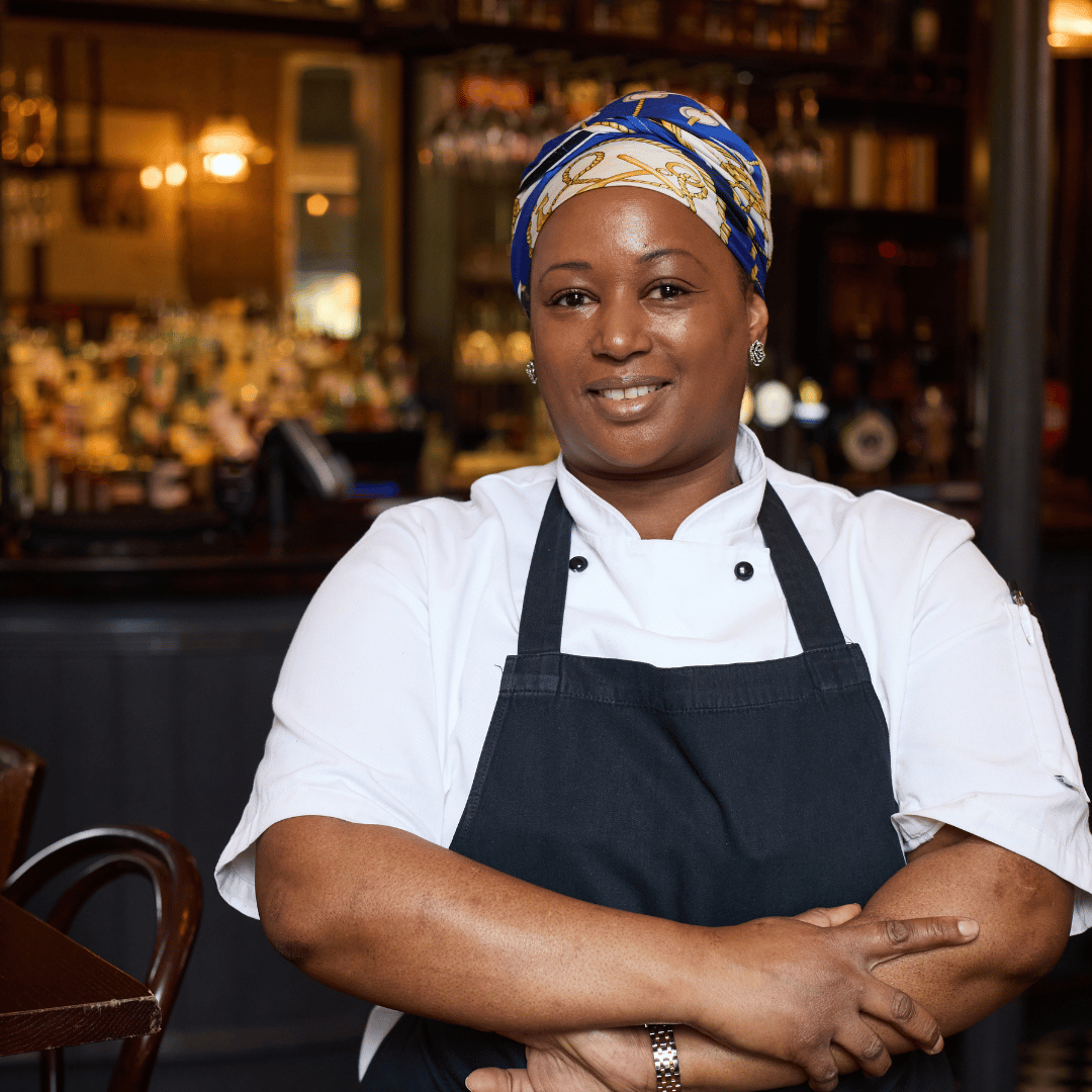 Kitchen Team Member smiling towards the camera