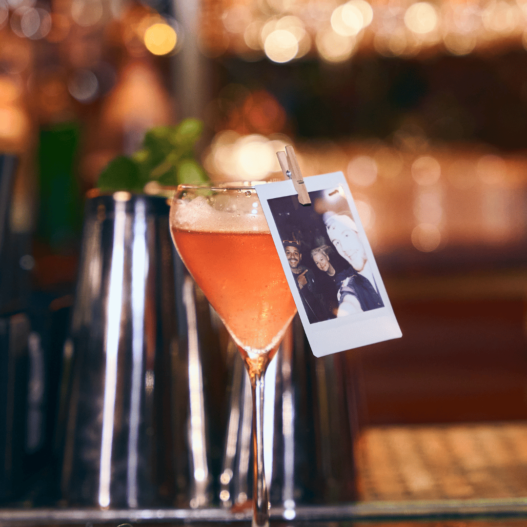 Be At One cocktail with polaroid picture attached