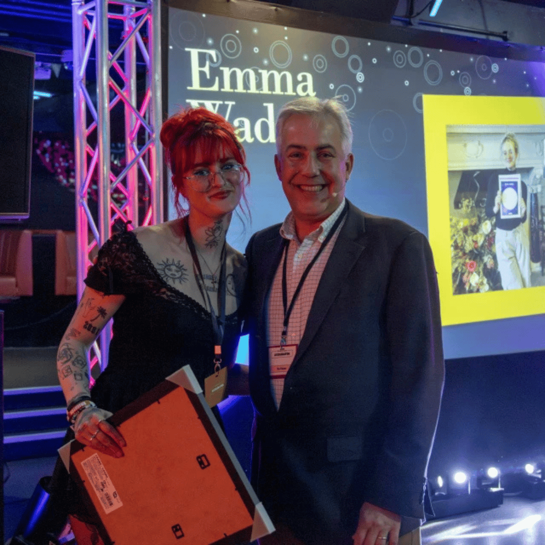 Emma Wade presented with the award by Tim Painter, HR Director