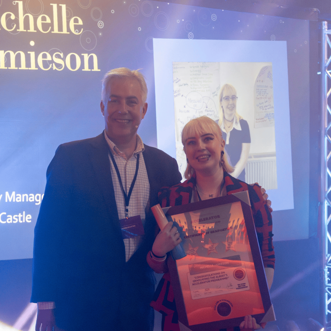 Michelle Jamieson presented with the award by Tim Painter, HR Director