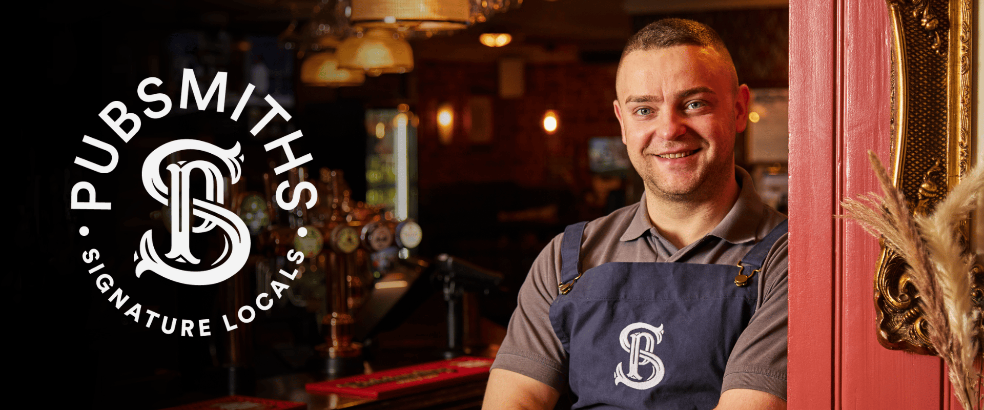 Pubsmiths logo overlayed onto image of a team member wearing an apron and smiling towards the camera