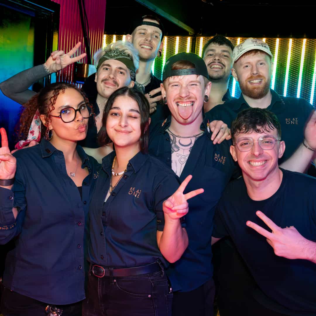 Image of the Be At One Bartender Challenge finalists smiling at the camera.