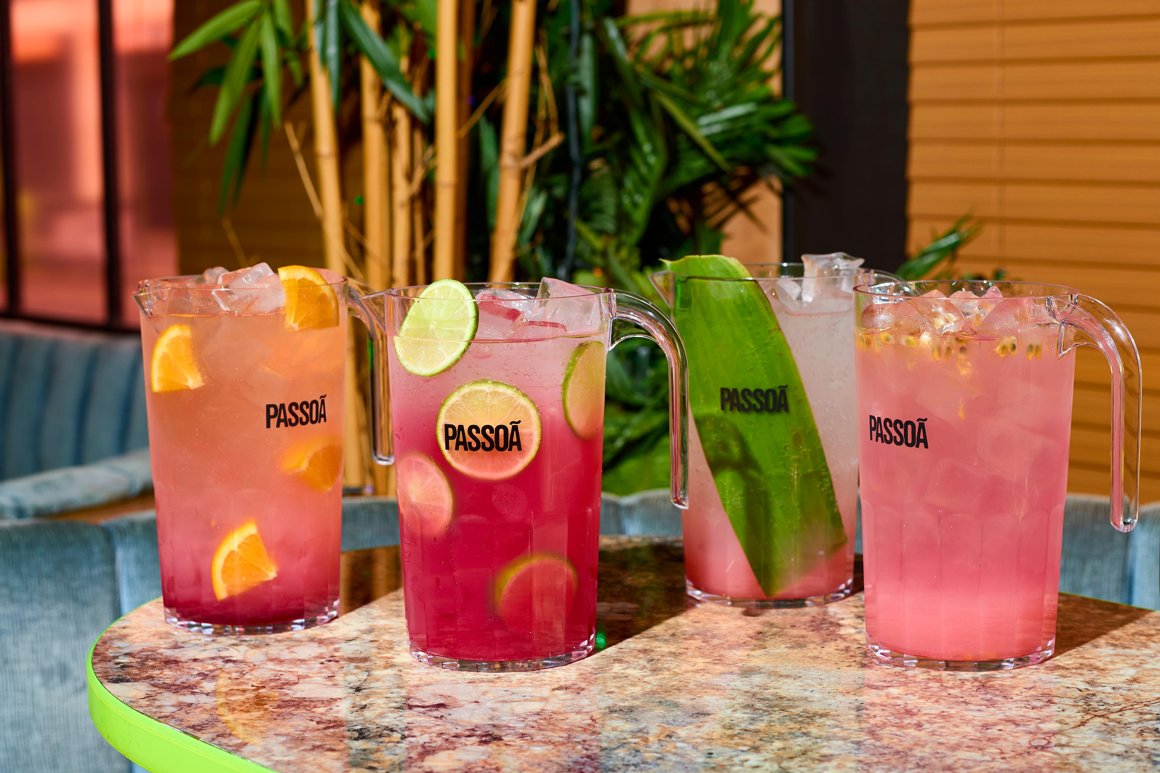 Group shot of Nikki's Summer jug cocktails on a table