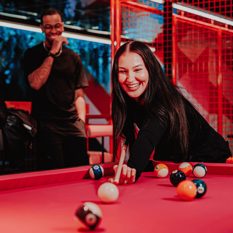 Guests playing pool at PLAYBOX in Croydon