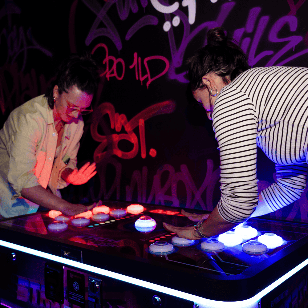 Customers playing Strike Light at PLAYBOX in Croydon