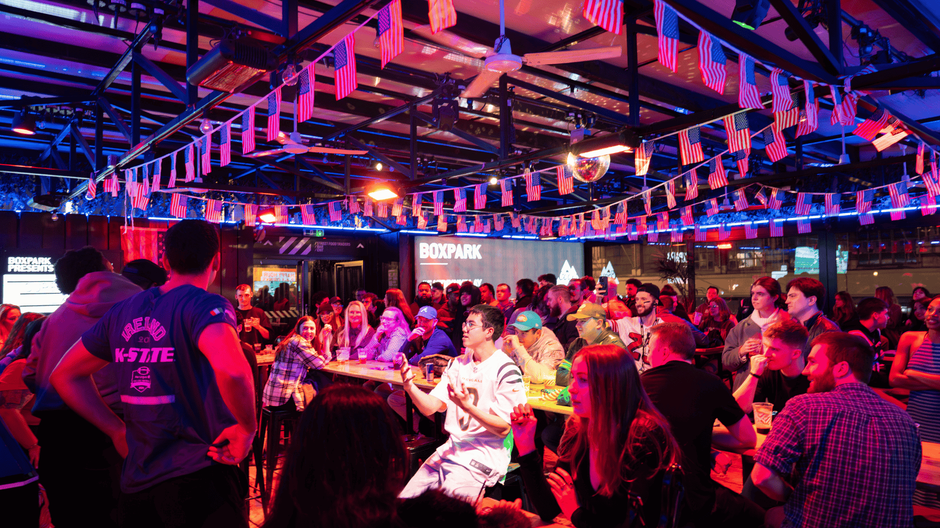Guests watching the Super Bowl at Boxpark