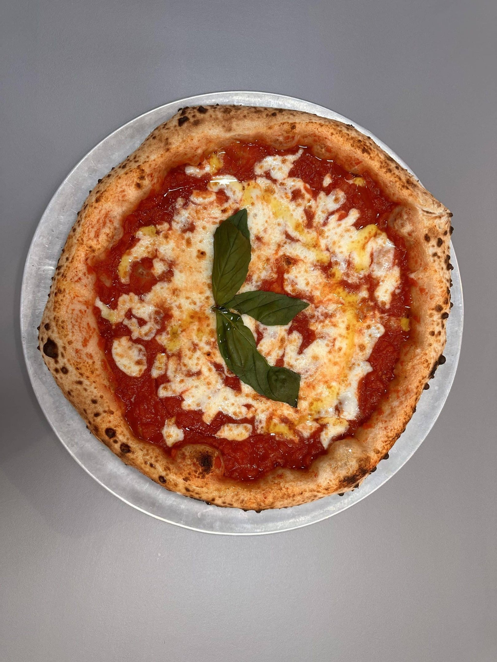 a Pizza from Grano Tenero Pizza at Boxpark Camden