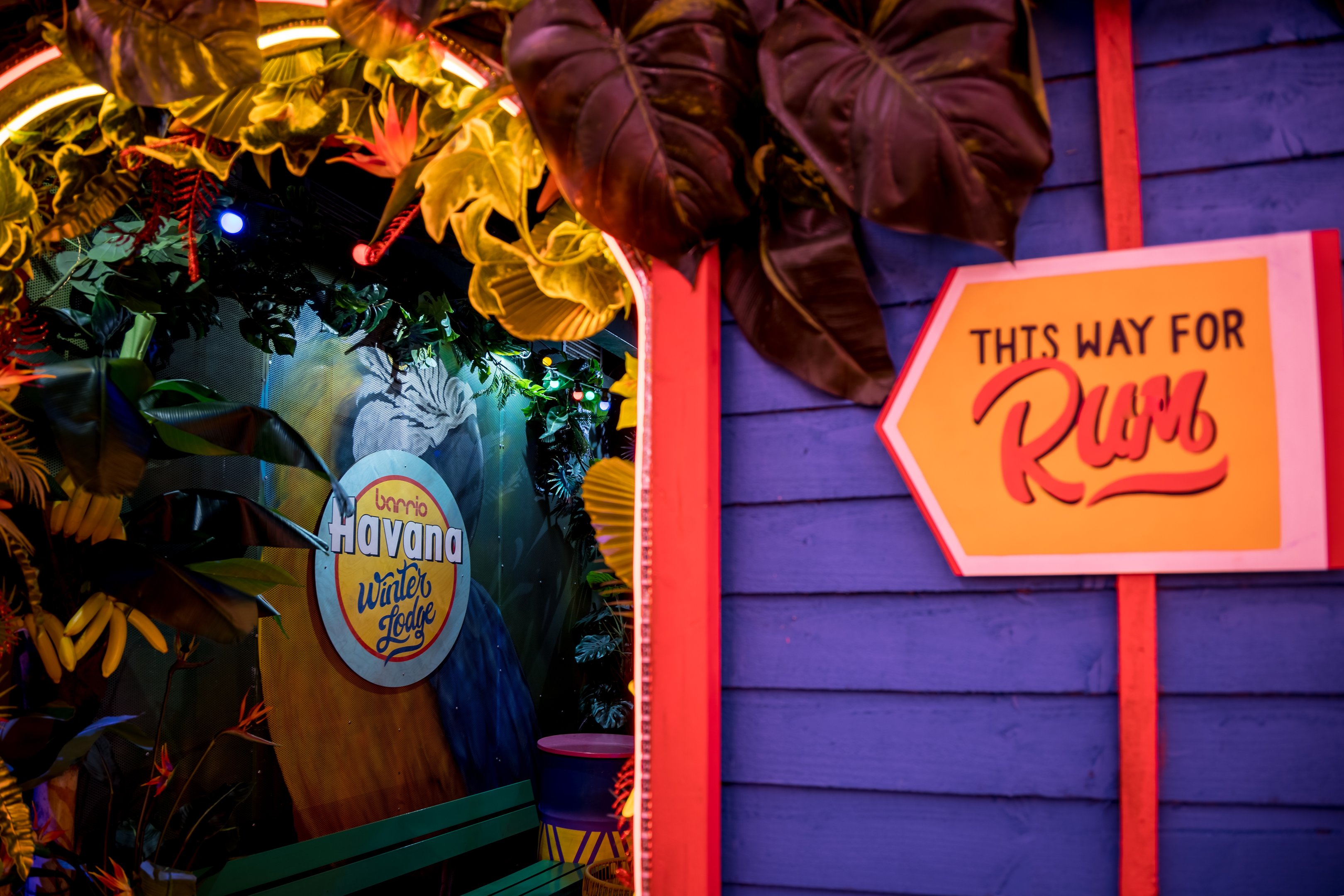 This way for Rum sign in the Barrio Shoreditch winter lodge