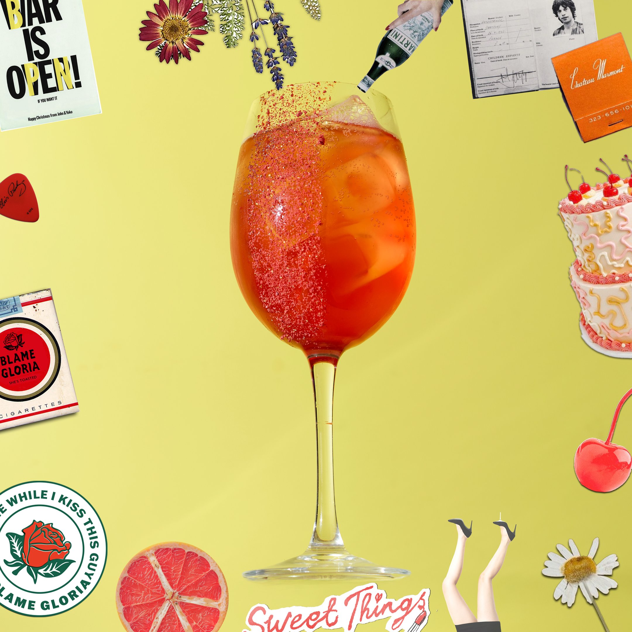 A Diva Spritz mocktail on a yellow background