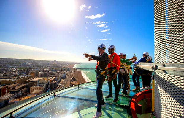 Customers walking around the top of the Brighton i360 pod