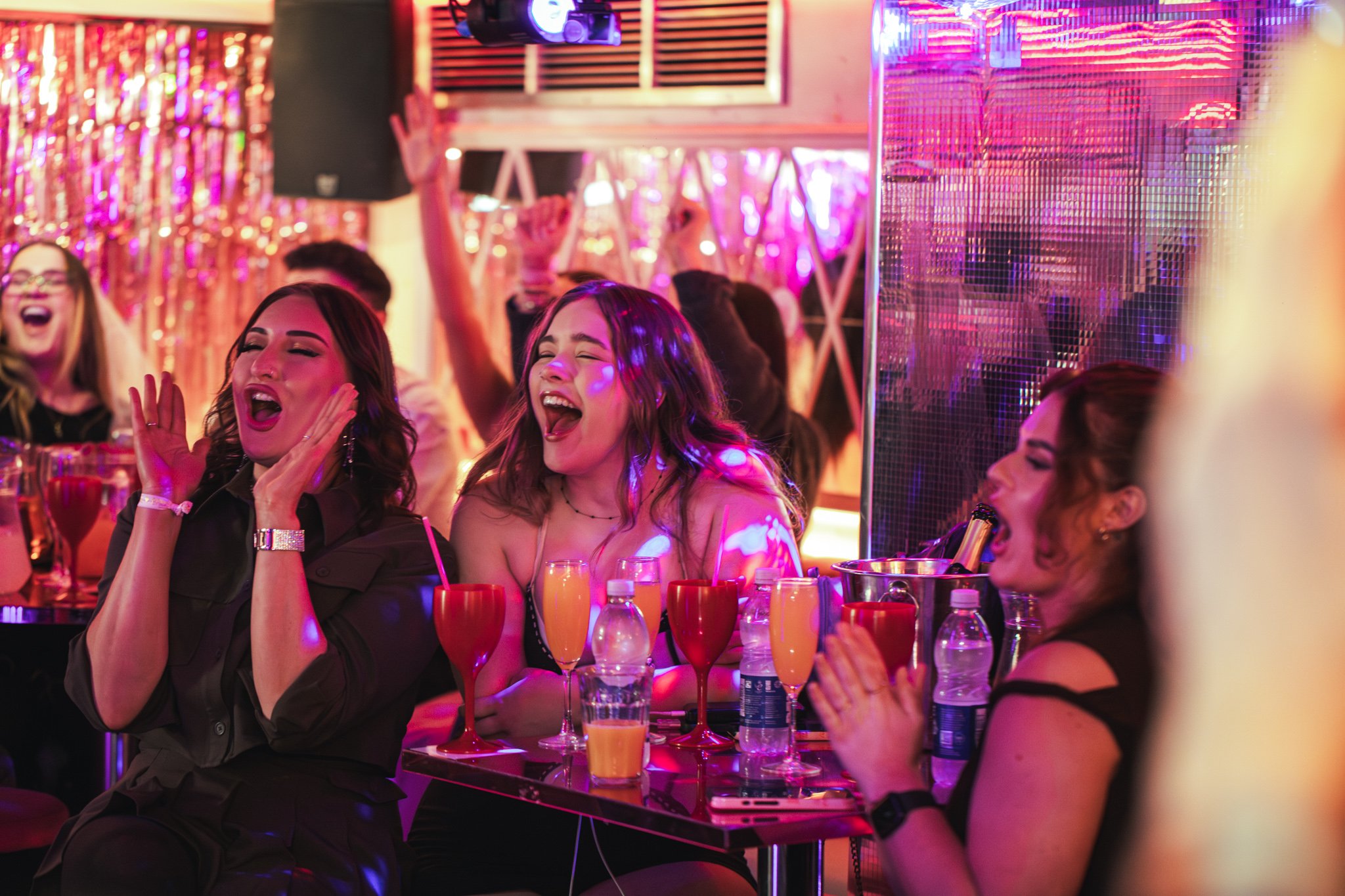 Guests enjoying bottomless brunch entertainment in Tonight Josephine