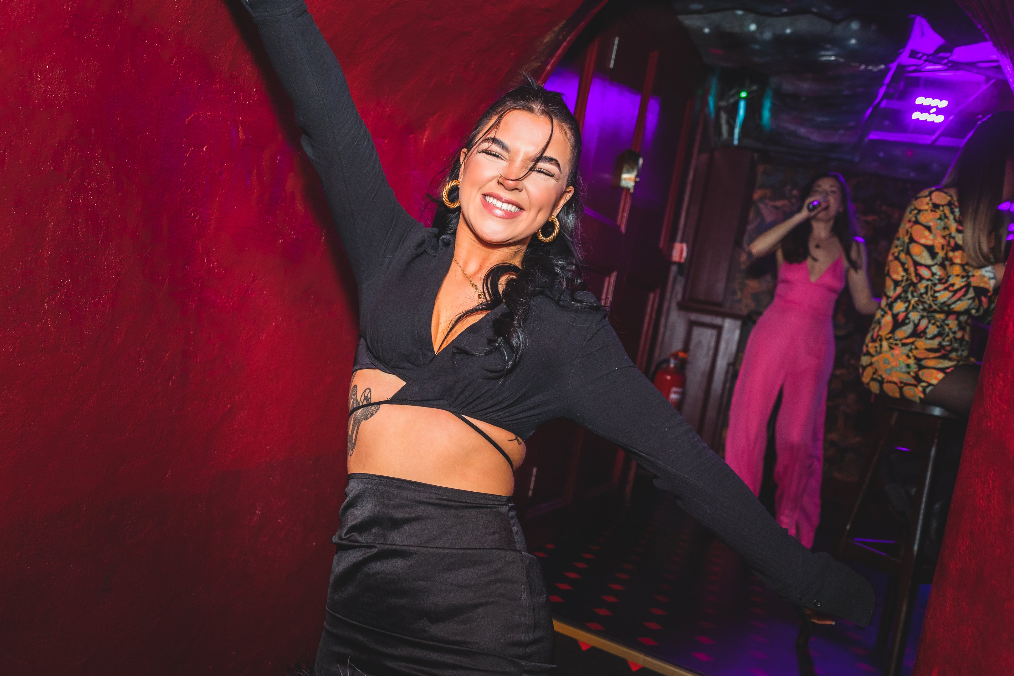 A guest dancing at a bottomless brunch in The Escapologist