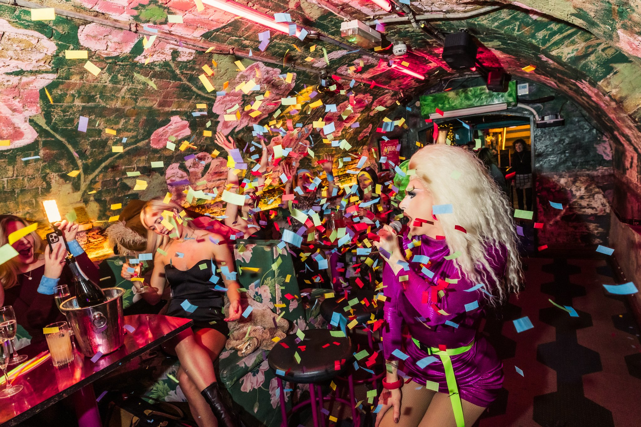 Guests enjoying a drag performance in Blame Gloria