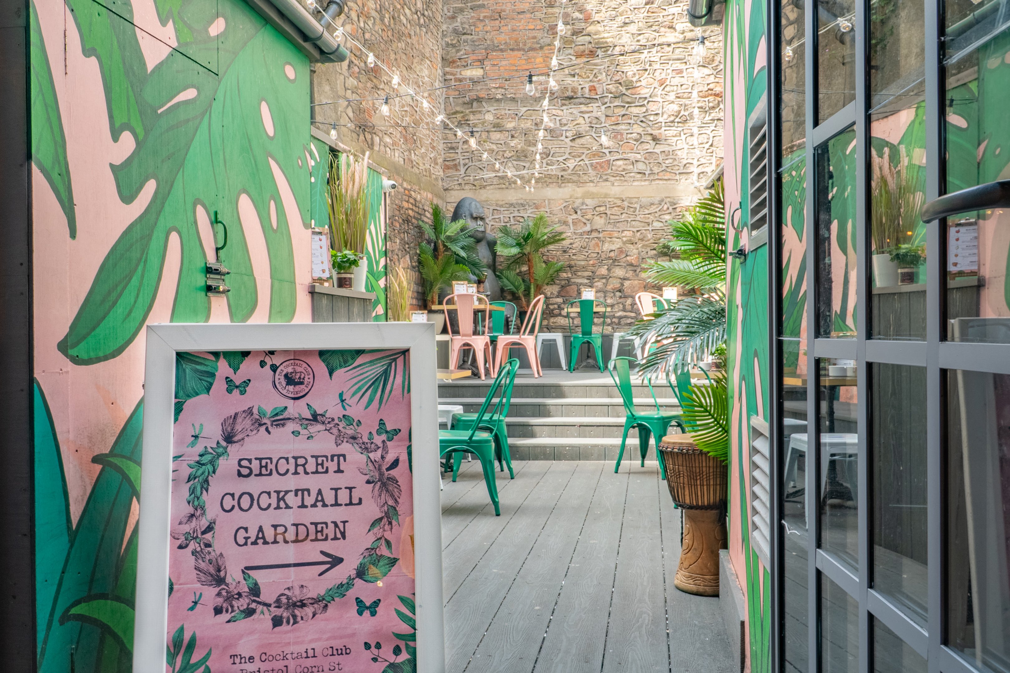 The entrance to Bristol Corn Street Secret Cocktail Garden at The Cocktail Club