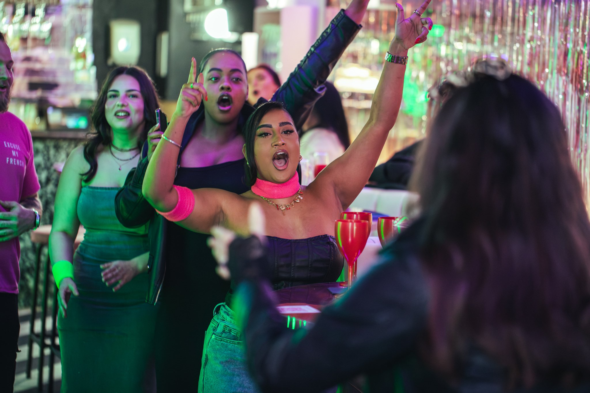 Guests singing with a live performer in Tonight Josephine